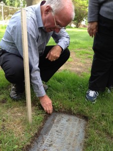 cleaning Lisette's gravestone