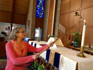 Sylvia lighting candles